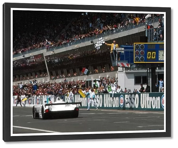 Le Mans 24 Hours: Pierluigi Martini BMW V12 LMR crosses the line to win the 24 Hours