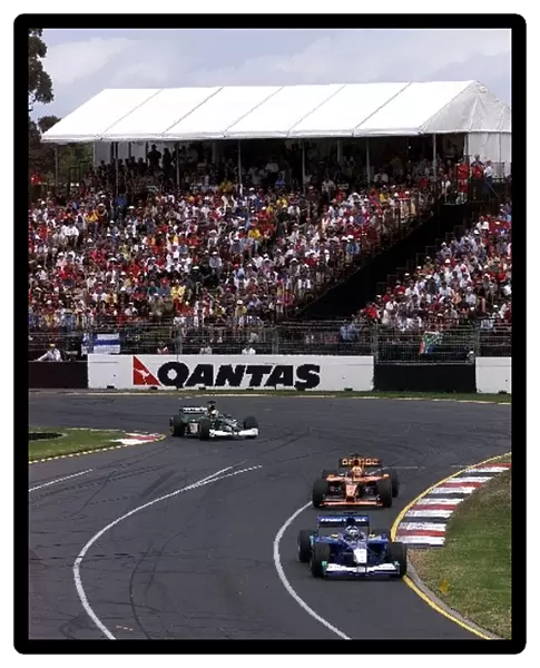 Formula One World Championship: Kimi Raikkonen Sauber Petronas C20 leads Luciano Burti Jaguar Cosworth R2