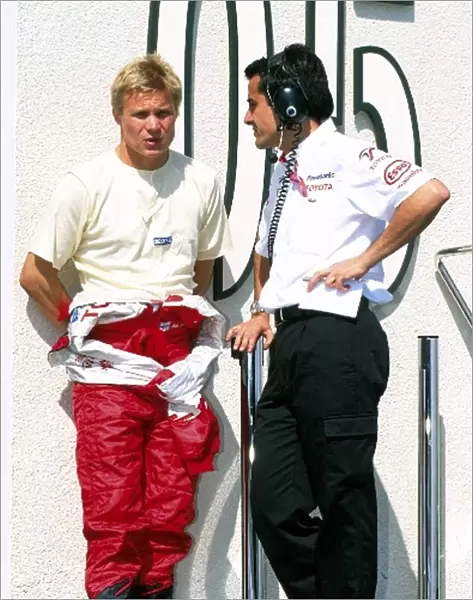 Formula One Testing: Mika Salo talks with Ange Pasquali Toyota Motorsport Team Manager