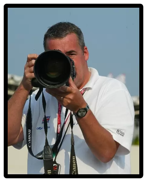 Formula One World Championship: Mark Sutton Sutton Motorsport Images demonstrates the new 32 megabyte Canon 1DS digital camera