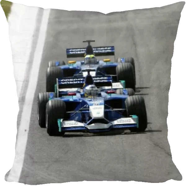 Formula One World Championship: The two Sauber Petronas C21 team mates, Nick Heidfeld and Felippe Massa battle for position into Rivazza