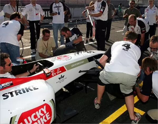 Formula One World Championship: The UK media team take part in a BAR pitstop challenge event