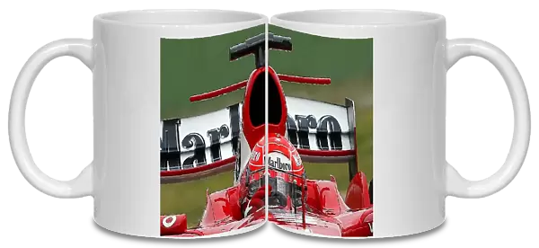 Formula One Testing: Michael Schumacher Ferrari F2004 with a mid-wing