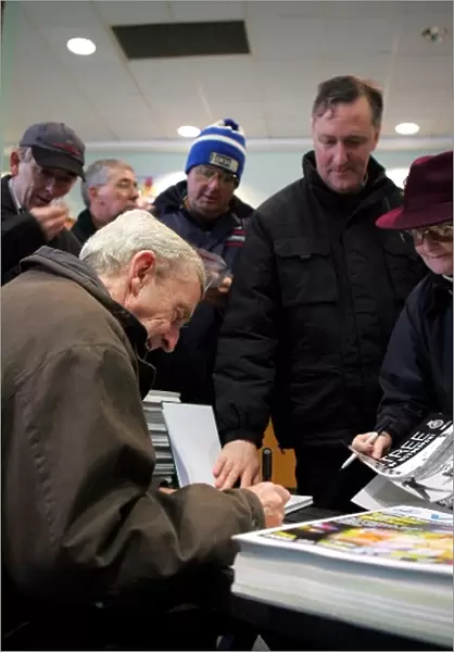 Aintree Festival of Motorsport: Tony Brooks signs autographs for the fans