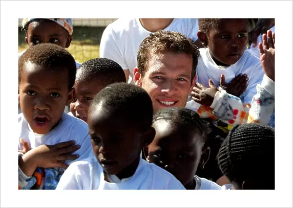 Unite Against Hunger: Alex Wurz McLaren Mercedes children at a school in Soweto which is being helped by Unite Againts Hunger
