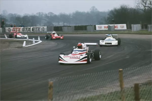 1977 Vandervell British Formula 3 Championship. Silvesrtone, Great Britain. 6th March 1977. Rd 1. Tiff Needell (March 773 - Triumph Dolomite  /  Holbay), 4th position, leads Ian Flux (Ralt RT1 - Toyota  /  Novamotor), retired, action