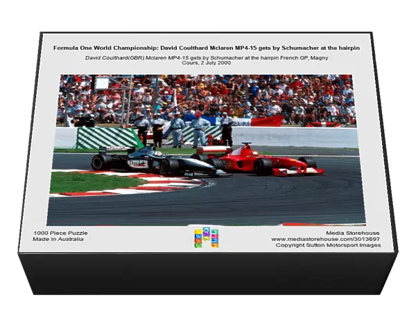 Formula One World Championship: David Coulthard Mclaren MP4-15 gets by Schumacher at the hairpin