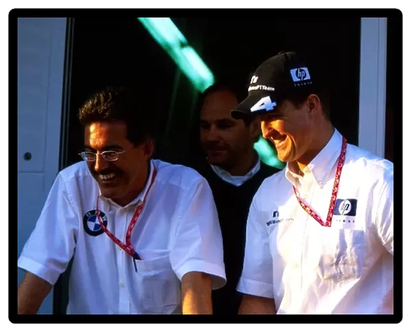 Formula One World Championship: Dr Mario Theissen BMW Motorsport Technical Director; Gerhard Berger Retiring BMW Competitions Director; Ralf