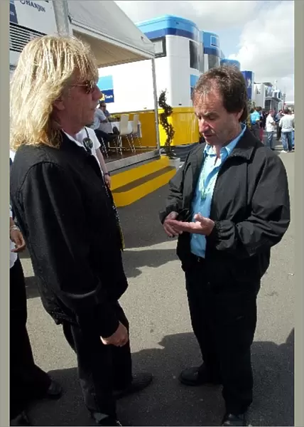 Formula One World Championship: Rick Parfitt of Status Quo with Chris de Burgh