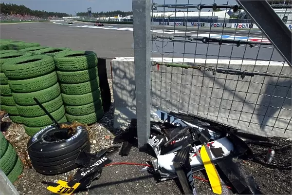 Formula One World Championship: Mostly McLaren debris from the MP4  /  17D of Kimi Raikkonen after the first corner crash