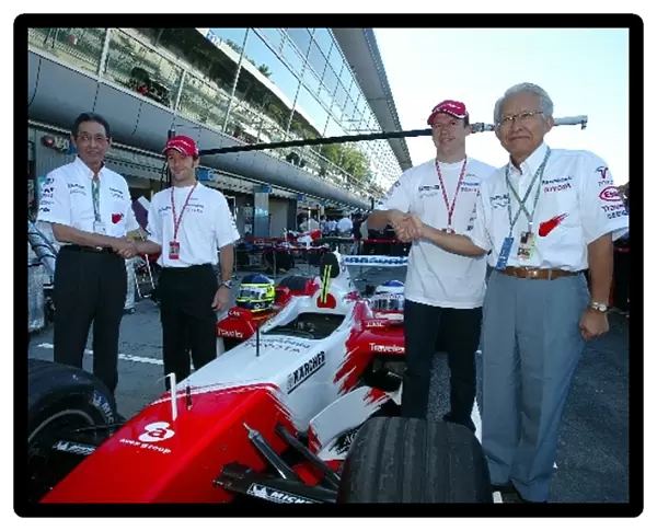 Formula One World Championship: Mr Nakamura Panasonic President, Cristiano Da Matta Toyota, Olivier Panis Toyota and another Panasonic VIP in