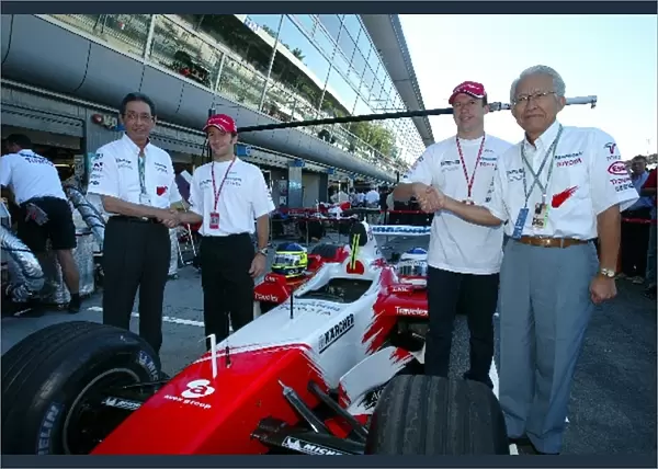 Formula One World Championship: Mr Nakamura Panasonic President, Cristiano Da Matta Toyota, Olivier Panis Toyota and another Panasonic VIP in