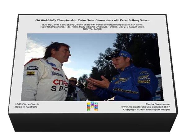 FIA World Rally Championship: Carlos Sainz Citroen chats with Petter Solberg Subaru