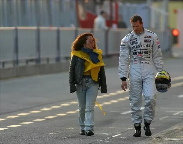 Formula One Testing: Journalist, Niki Takeda chats with Alex Wurz McLaren Mercedes MP4-17D at the end of the days running
