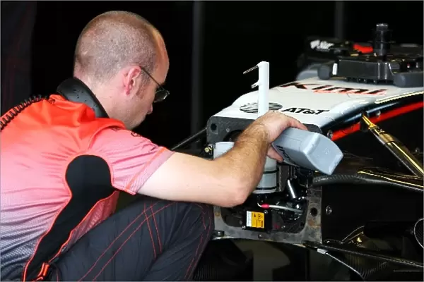 Formula One World Championship: Mobil brake fluid is added to the McLaren Mercedes MP4  /  20