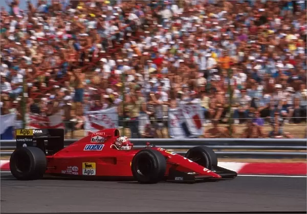 Formula One World Championship: Nigel Mansell, Ferrari 641, retired but classified 17th