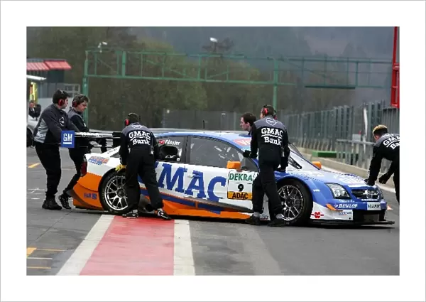 DTM Pre-Season Testing: Opel mechanics push the car of Marcel Fassler, Opel Performance Center, Opel Vectra GTS V8, back into the pits