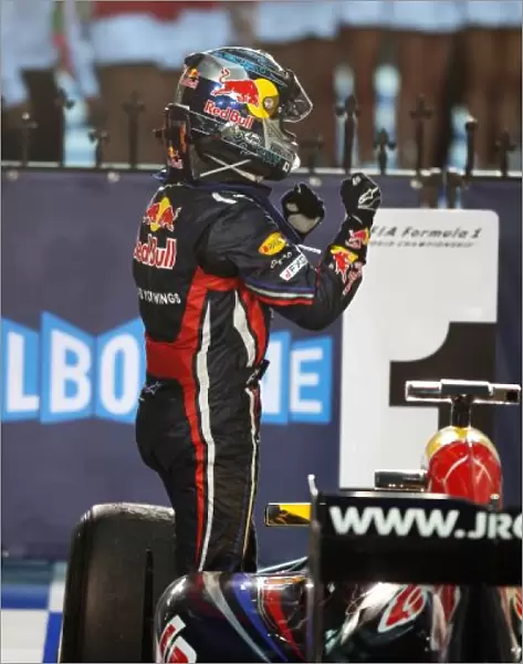 Formula One World Championship: Race winner Sebastian Vettel Red Bull Racing RB7 celebrates in parc ferme