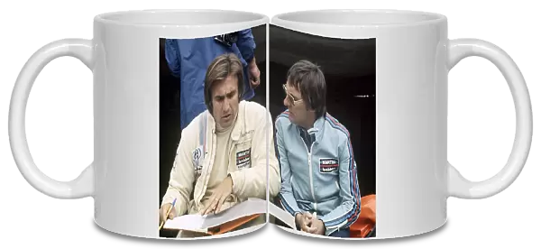 Zolder, Belgium. 25 May 1975: Bernie Ecclestone with Carlos Reutemann, Brabham BT44B-Ford, 3rd position, portrait
