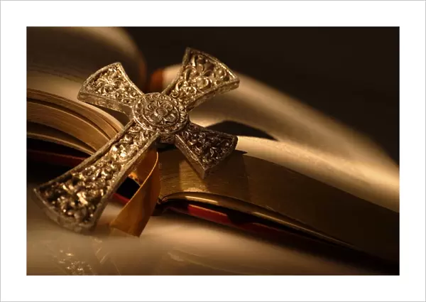 Gold Cross On Open Bible