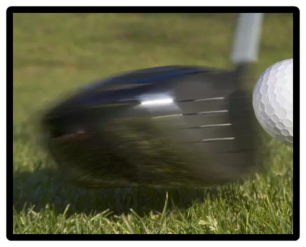 Golf Ball On Tee Hit By Driver