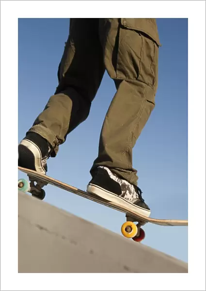 Low Angle View Of Young Male Skateboarder