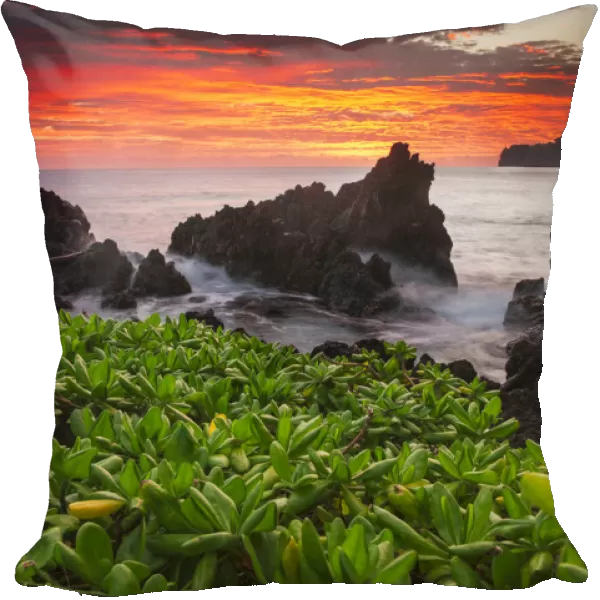 Sunrise Over The Ocean And Coastline; Laupahoehoe, Island Of Hawaii, Hawaii, United States Of America