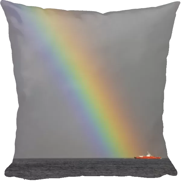 Dunoon, Argyll, Scotland; Rainbow Leading To A Boat On The Ocean