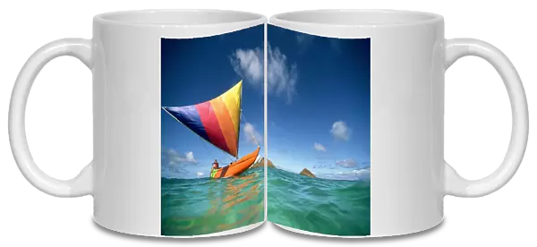 Hawaii, Oahu, Lanikai, Man In Colorful Sailing Canoe