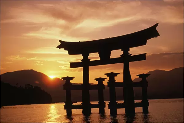 Japan, Kyushu, Miyajima Torii Gate In Water, Itsukushima Shrine, Peaceful Sunrise