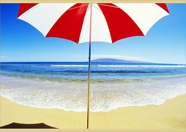Red And White Umbrella On The Beach, Blue Sky And Ocean
