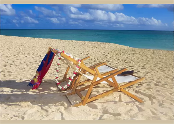 Hawaii, Oahu, Kailua, Two lounge chairs on the white sandy beach of Lanikai