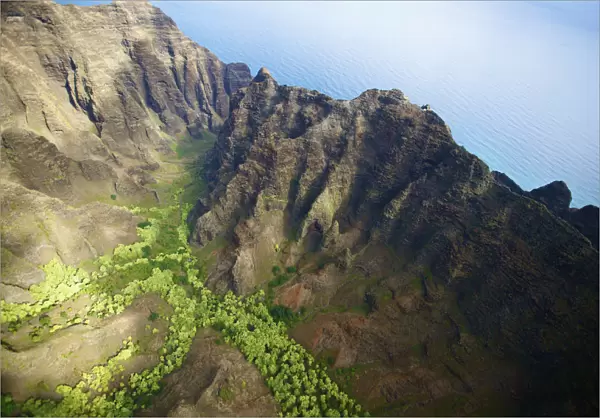 Aerial View Of The Rugged Landscape Along The Coast Of A Hawaiian Island, Na Pali Coast; Kauai, Hawaii, United States Of America
