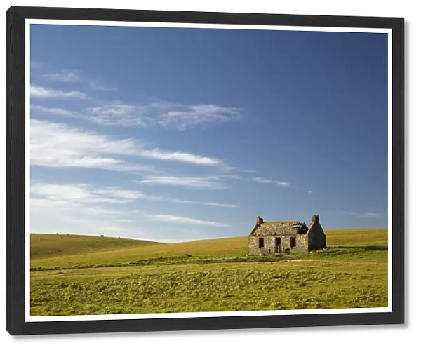 An abandoned farm building alone in the middle of a field; Dumfries and galloway scotland