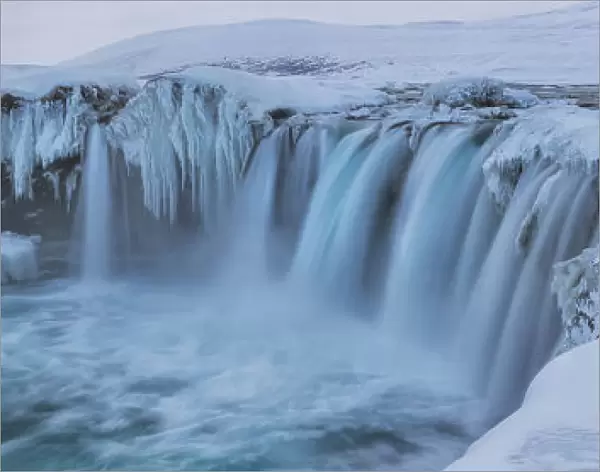 Godafoss With Large Pieces Of Ice Forming In The Cold Weather; Iceland