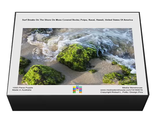 Surf Breaks On The Shore On Moss Covered Rocks; Poipu, Kauai, Hawaii, United States Of America