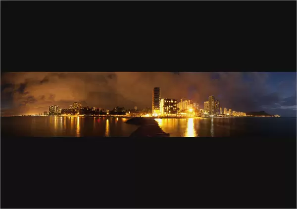 Full View Of Waikiki Beach At Night; Honolulu, Oahu, Hawaii, United States Of America