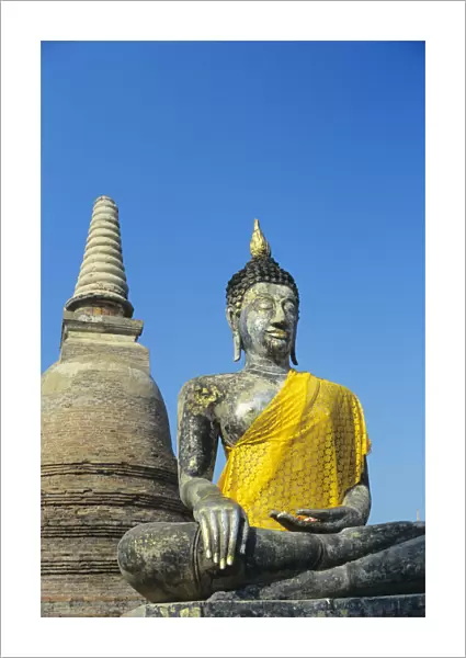 Thailand, Sukhothai, View of Buddha Statue And Temple; Wat Mahathat