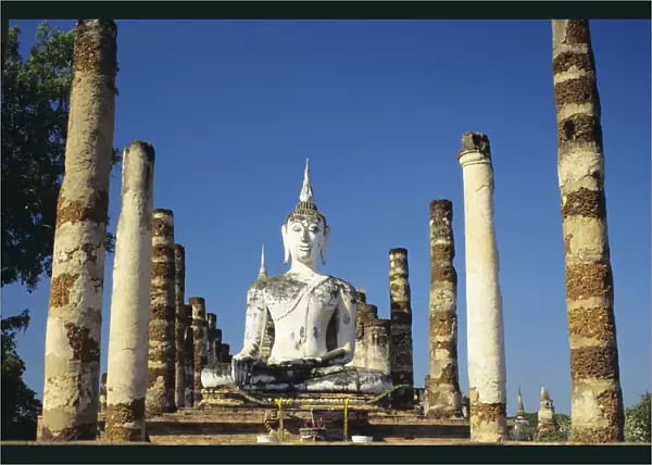 Thailand, Sukhotha, View of Buddha Statue And Pillars; Wat Mahathat