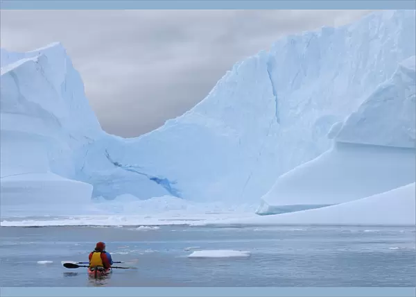 Iceberg and Sea Kayak, Rode Fjord, Scoresby Sund, Greenland