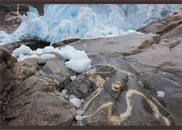 end of Nigardsbreen glaciar with ice on rocks, Nigardsbreen, Norway