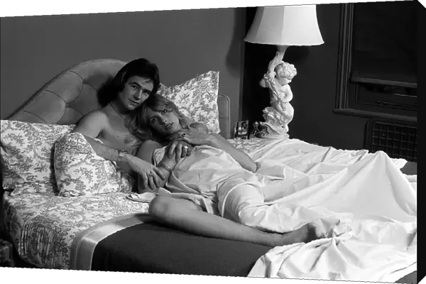 Barry Sheene with Stephanie McClean at home in bed. February 1977