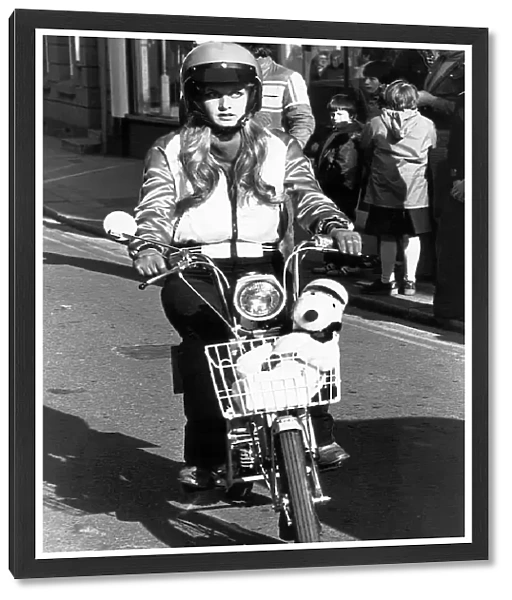 MotorCycles - Twiggy shows how simple the moped is to drive April 1978