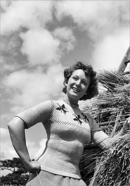 Jean Kert wearing a Special Jumper on her farm in Sussex. August 1953 O20002-001