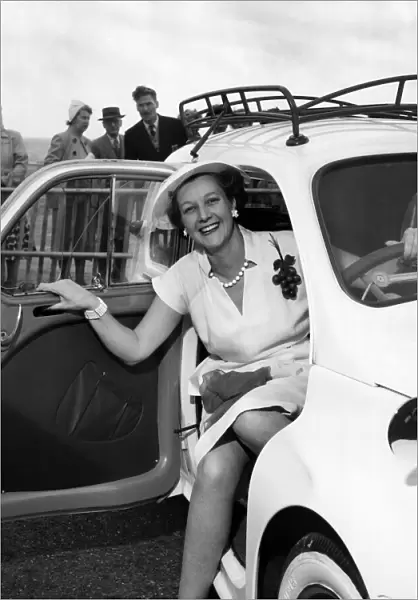 Mrs. Gordan Offord poses in a car during the Brighton beauty contest
