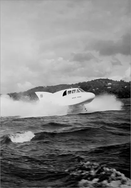 First Picture of the White Hawk speedboat at Speed. It can be seen riding on its