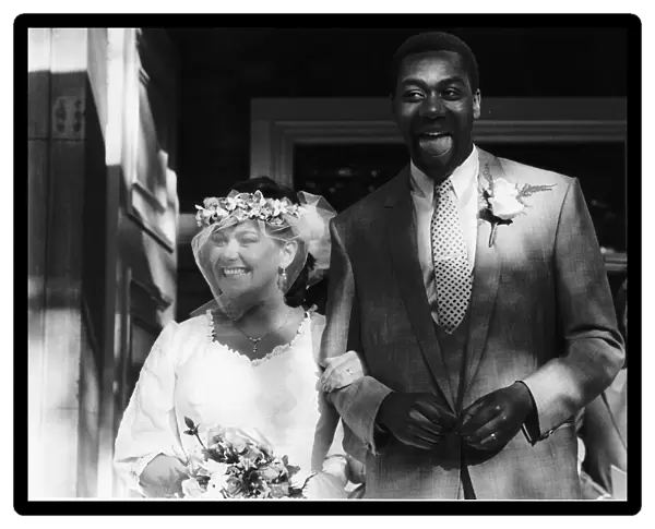 Comic Lenny Henry marries comedienne Dawn French at St Paul