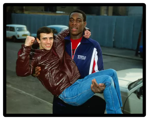 Frank Bruno boxer 1983 lifting and holding Charlie Magri