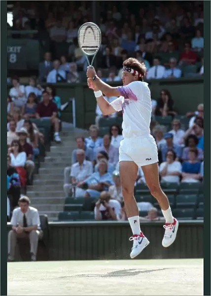 Wimbledon. Gabriella Sabatini, Andre Agassi, David Wheaton action. July 1991 91-4353-091