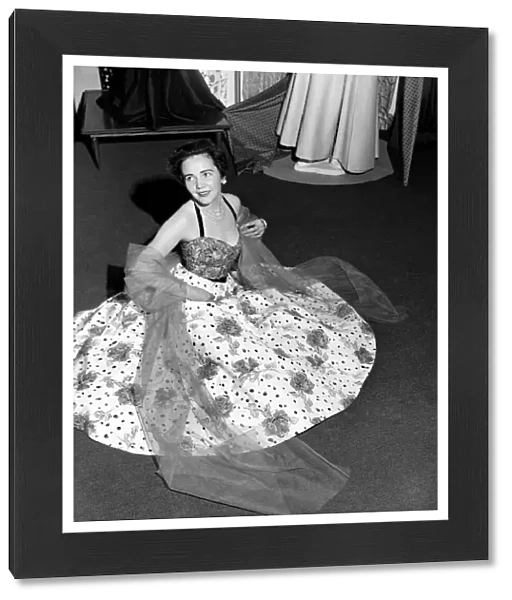 Clothing exhibition of fashion in Cotton 1953. Miss Nancy Bevan displaying a rose printed